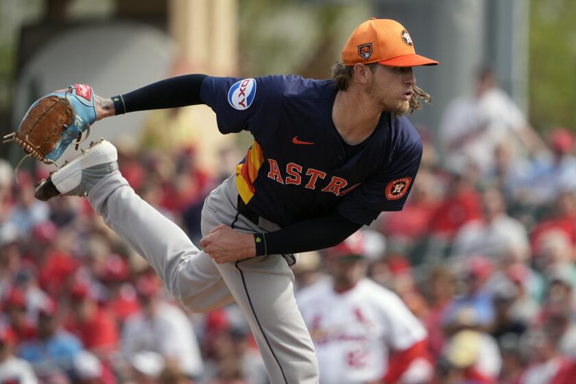 Houston Astros pitcher Josh Hader throws during the fifth inning of a spring training.