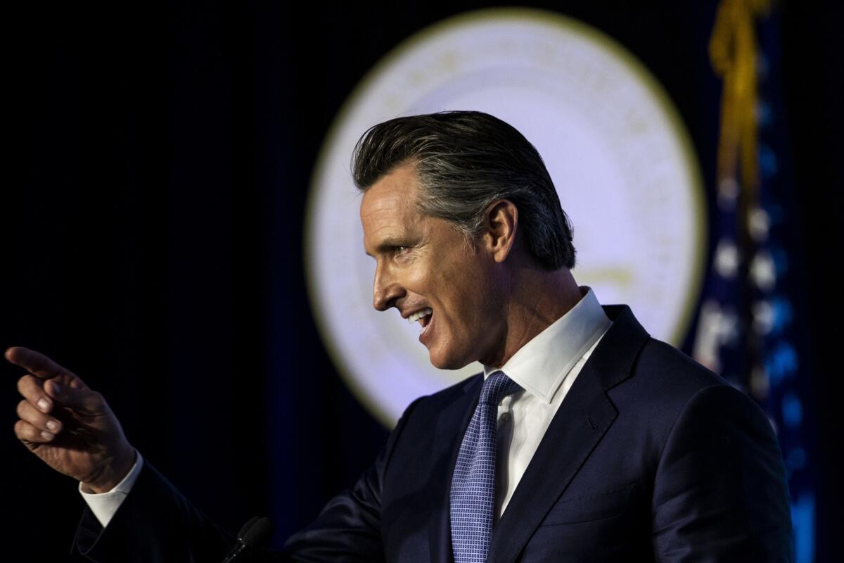 Gov. Gavin Newsom speaks after being sworn in on Jan. 7, 2019.