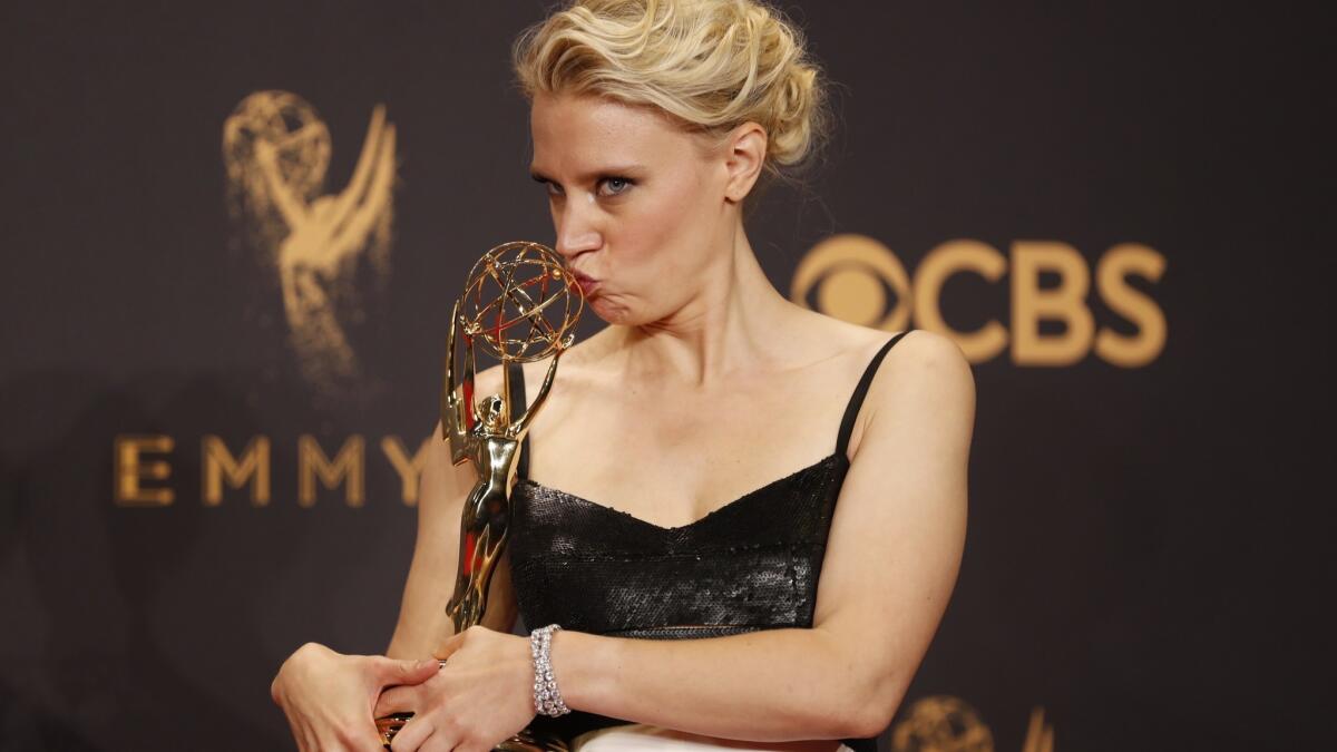 Kate McKinnon with her Emmy for supporting actress in a comedy at the 69th Emmy Awards in Los Angeles.