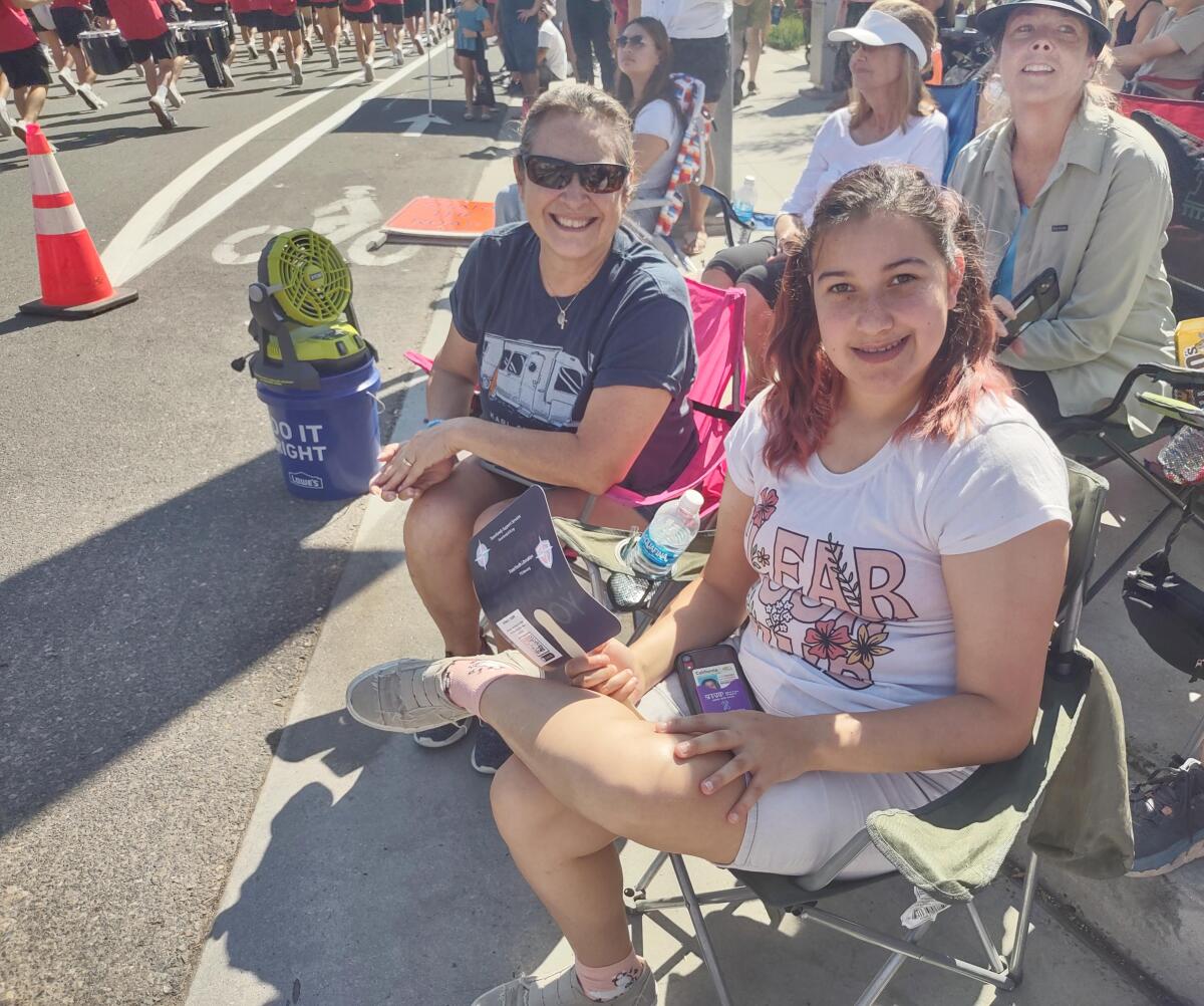 Longtime Poway resident Cecilia Bradley, left, attended the parade with her daughter, Bella Bradley.