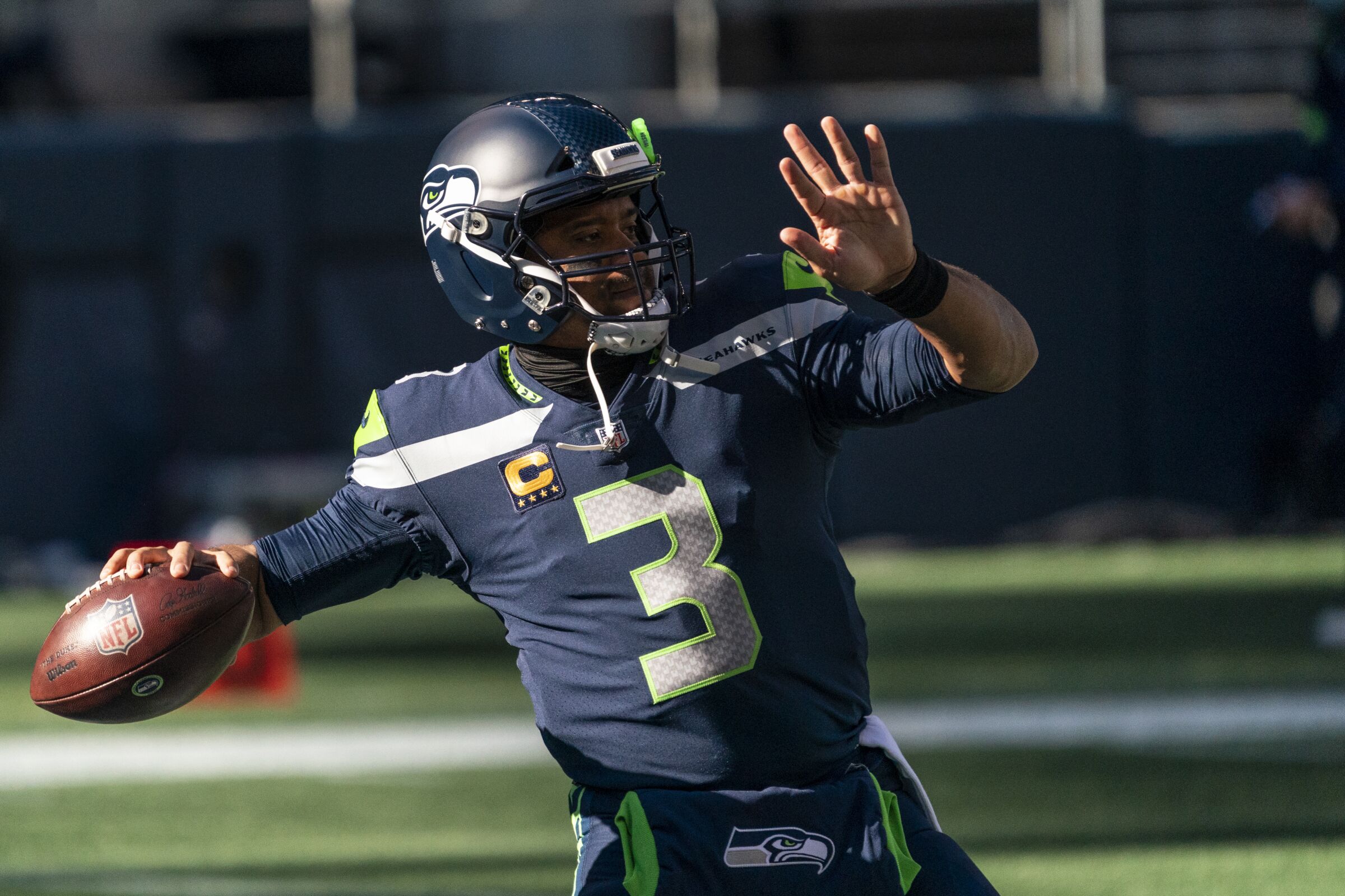 Seattle Seahawks quarterback Russell Wilson throws the ball during warmups.