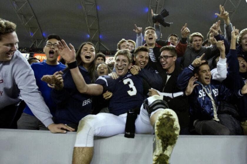 Quarterback Josh Rosen, in a 2013 photo, celebrating St. John Bosco going 16-0.