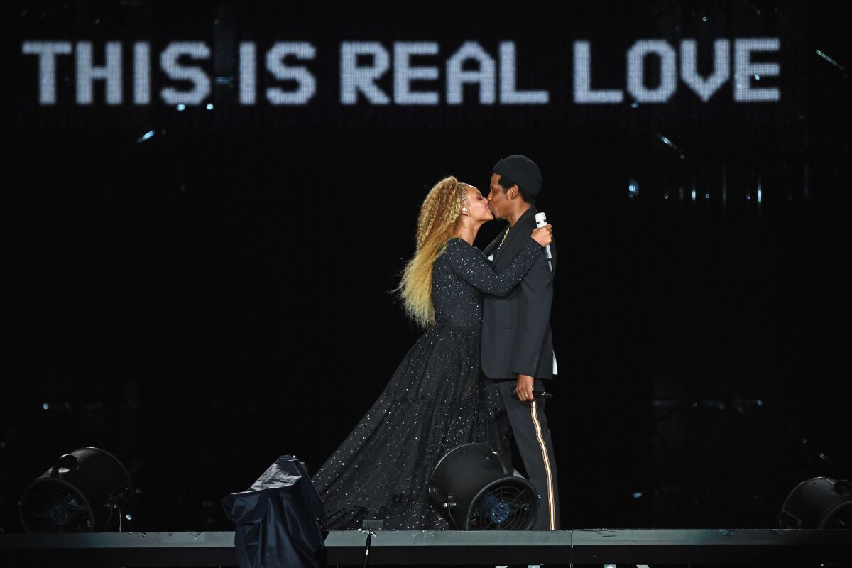 Beyonce and Jay-Z perform onstage during the On The Run II tour on Aug. 2 at MetLife Stadium in East Rutherford, New Jersey.