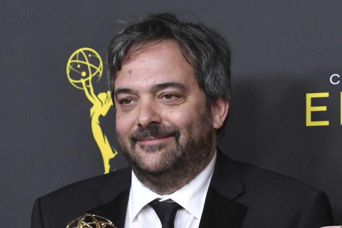 Adam Schlesinger, seen at the 2019 Creative Arts Emmy Awards, died Wednesday of coronavirus complications.