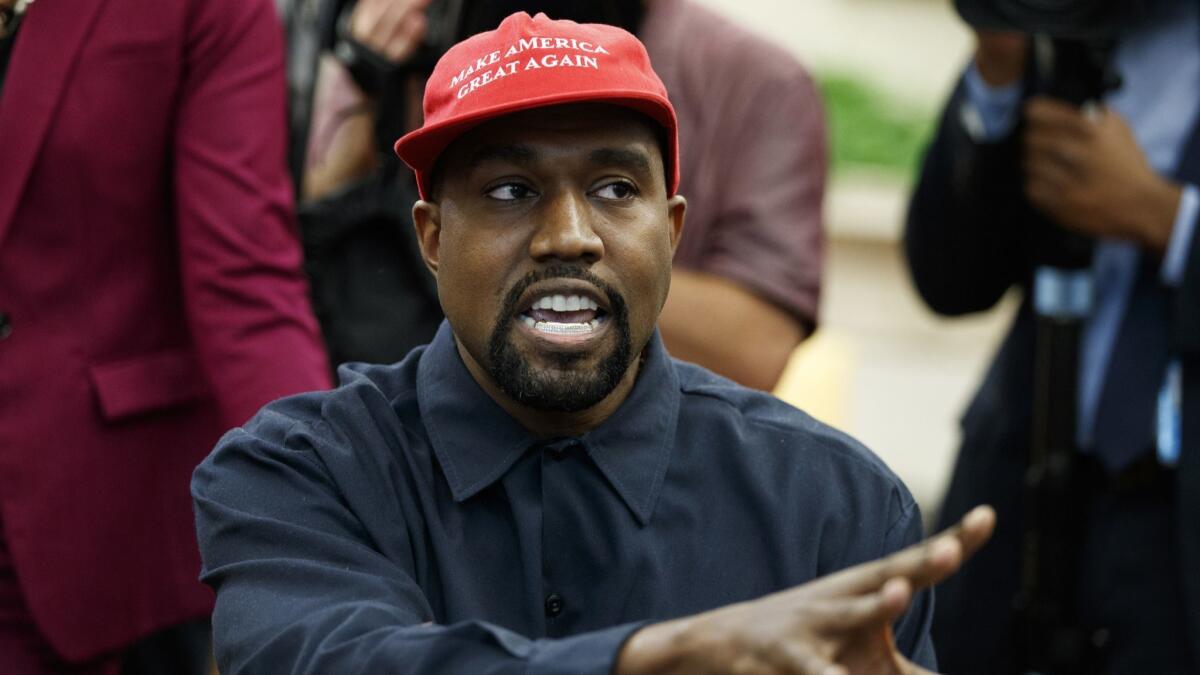 Rapper Kanye West speaks during a meeting in the Oval Office of the White House with President Donald Trump.