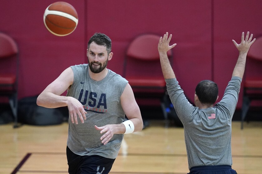 Kevin Love make a pass during practice for USA Basketball, Wednesday, July 7, 2021, in Las Vegas. (AP Photo/John Locher)