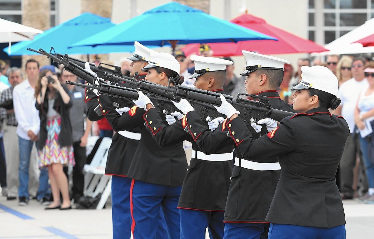 A rifle volley marks the 50th anniversary Memorial Dedication and remembrance to the servicemen killed in the crash of a C-135 Marine Corp plane on Loma Ridge in 1965 at the Great Park.