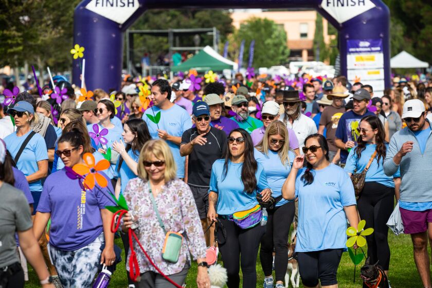Participants hit the trail for the 2022 San Diego Walk to End Alzheimer’s at Liberty Station's NTC Park.
