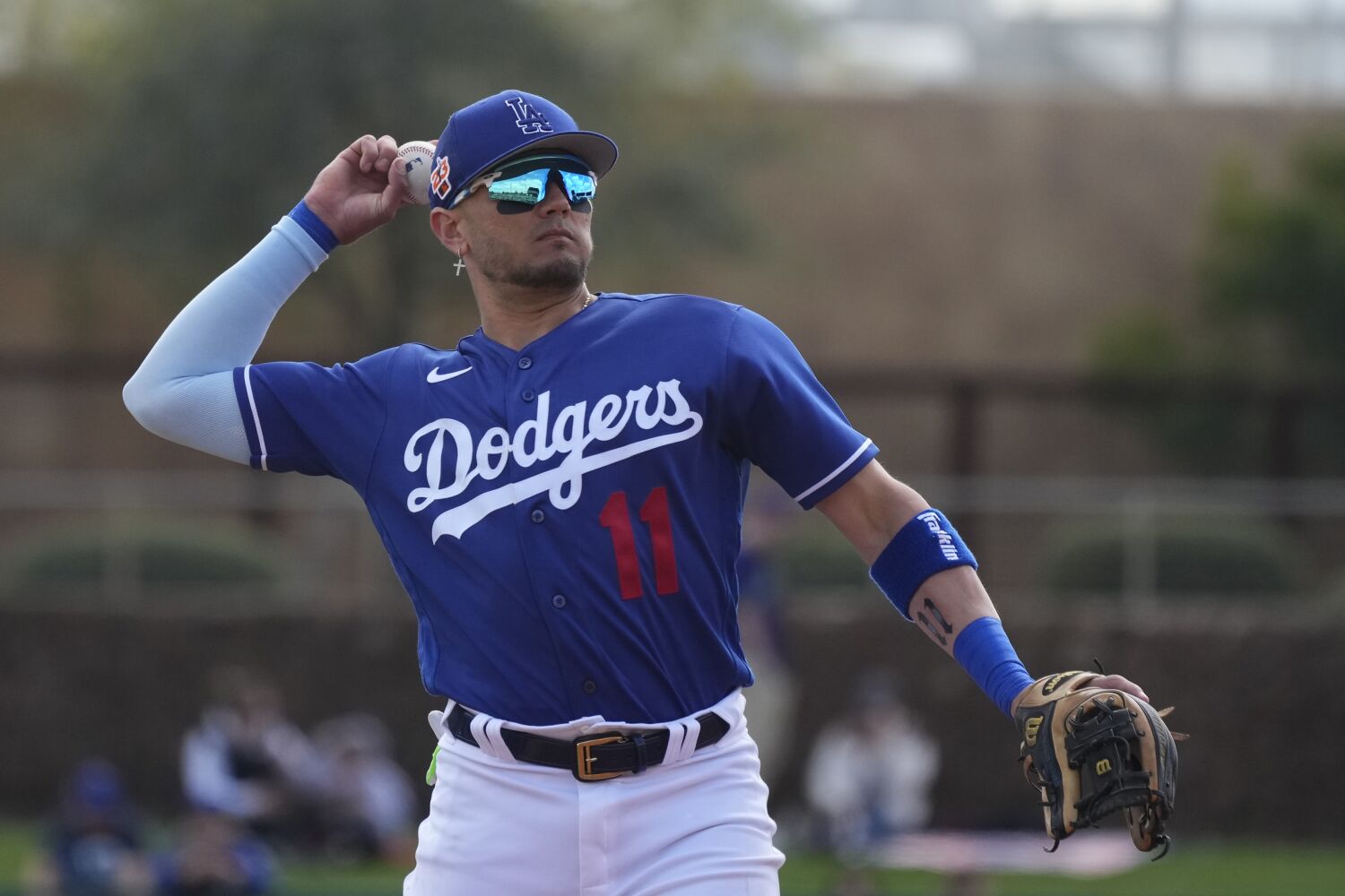 'His shoe game is pretty tight.' Why Dodgers hope Miguel Rojas' play matches his 'swag'