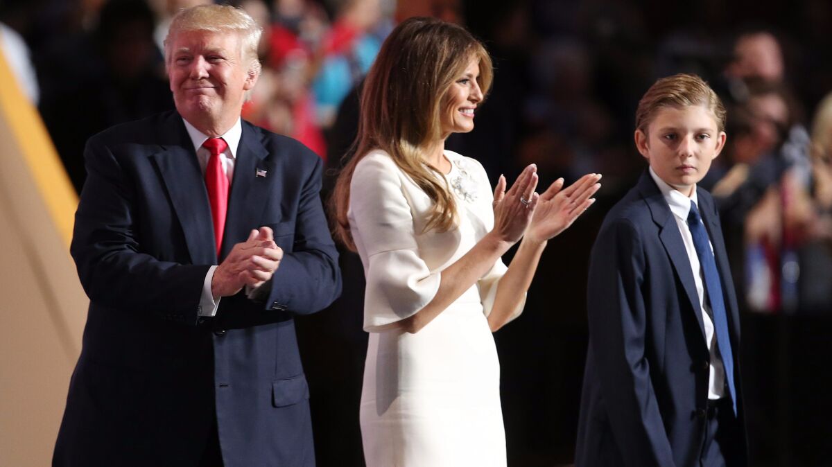 Melania Trump, with her son Baron, joins her husband Donald on stage at the RNC after his acceptance speech.