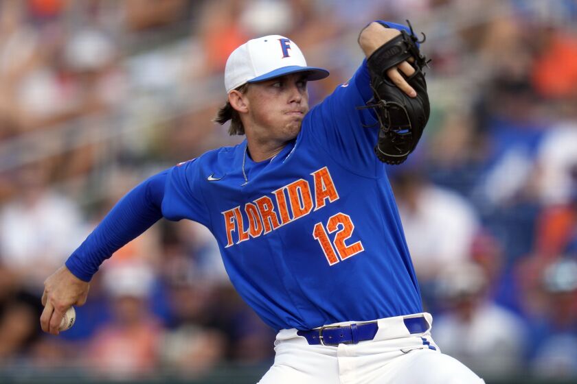 Florida pitcher Hurston Waldrep throws against South Carolina in the first inning of an NCAA college baseball tournament super regional game Saturday, June 10, 2023, in Gainesville, Fla. (AP Photo/John Raoux)