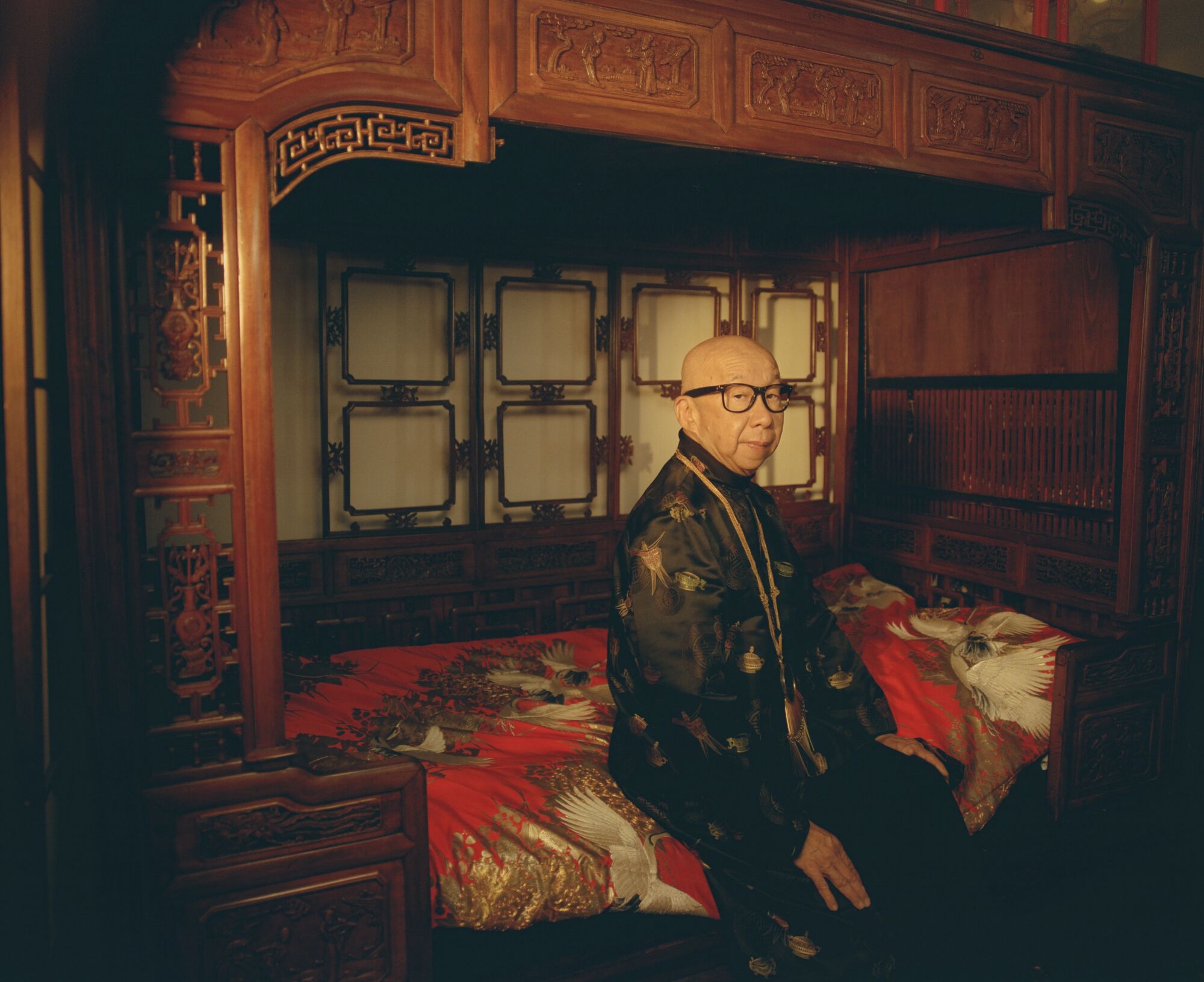 Lai sleeps in a hardwood opium bed that dates back hundreds of years, under a duvet he sewed out of a wedding kimono.