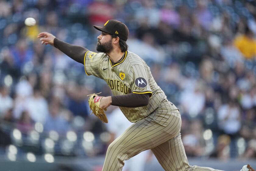 San Diego Padres starting pitcher Matt Waldron works against the Colorado Rockies during the first inning of a baseball game Wednesday, April 24, 2024, in Denver. (AP Photo/David Zalubowski)