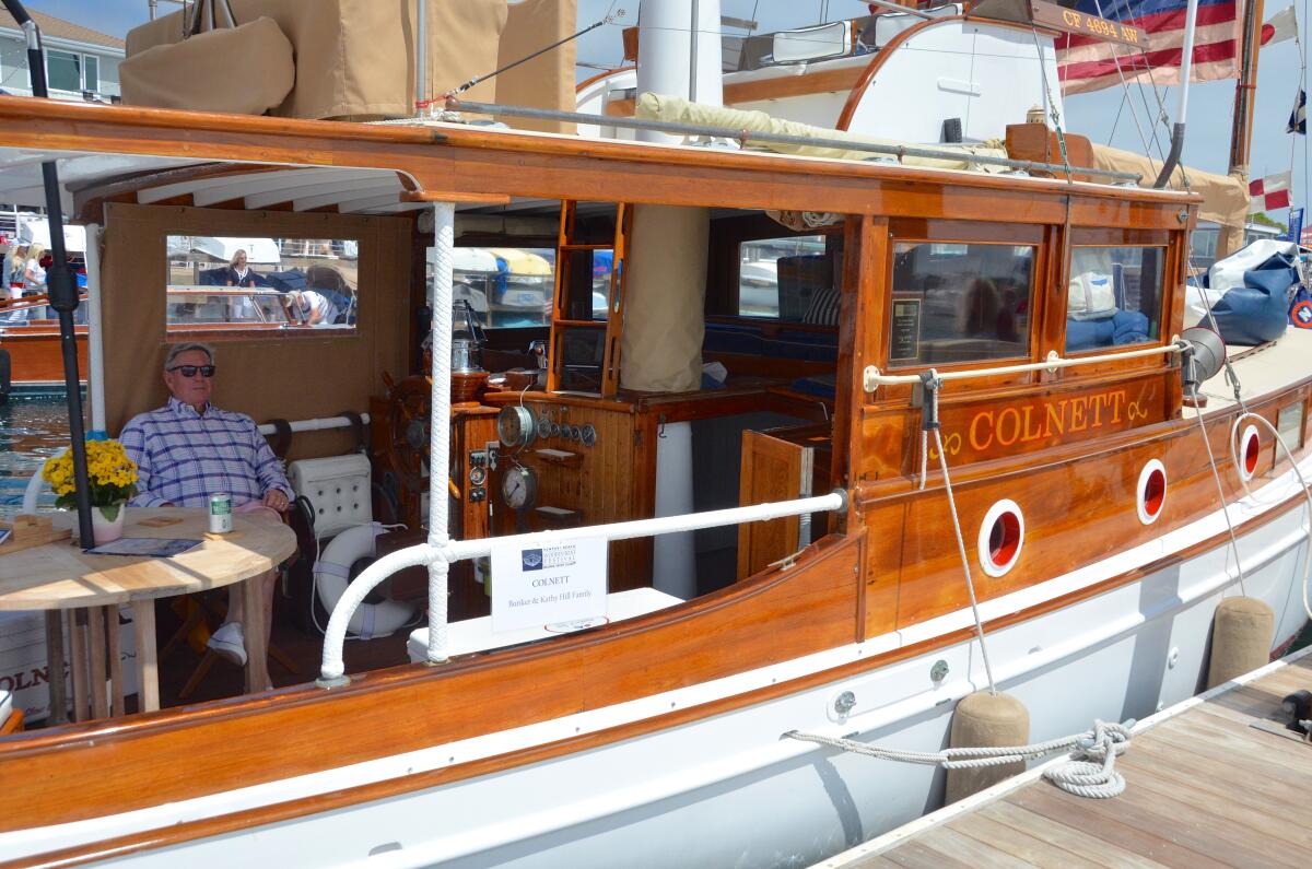 Bunker Hill sits in the salon of his 42-foot 1924 custom-built SeaCraft wooden vessel.