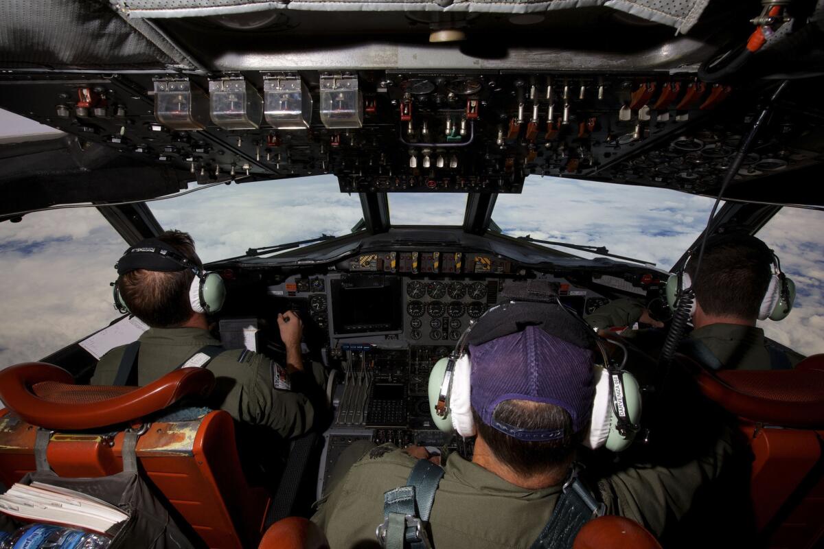 Australian air force crews have been searching the Indian Ocean for debris from Malaysia Airlines Flight 370.