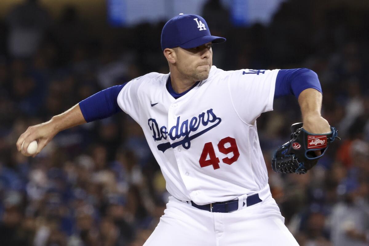 Dodgers relief pitcher Blake Treinen delivers during the seventh inning.