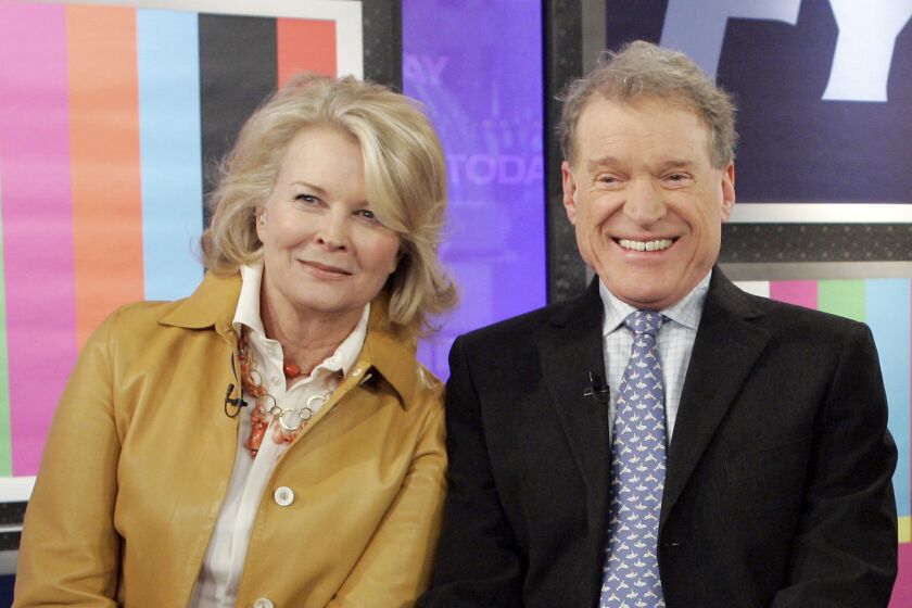 FILE - Charles Kimbrough, right, poses with Candice Bergen, a fellow cast member of the "Murphy Brown" TV series, as they are reunited for a segment of the NBC "Today" program in New York, on Feb. 27, 2008. Kimbrough, a Tony- and Emmy-nominated actor who played a straight-laced news anchor opposite Bergen on "Murphy Brown," died Jan. 11, 2023, in Culver City, Calif. He was 86. The New York Times first reported his death Sunday, Feb 5. (AP Photo/Richard Drew, File)