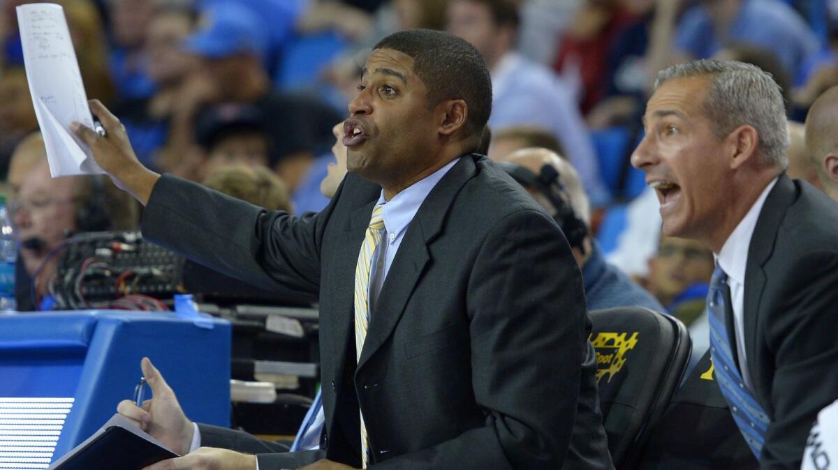 UCLA assistant coach Duane Broussard gestures during a game against Drexel in November 2013.