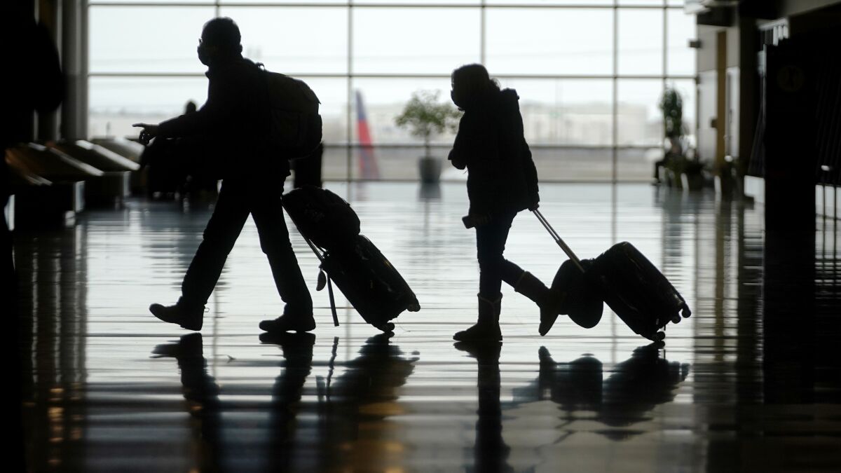 Travelers at Salt Lake City International Airport