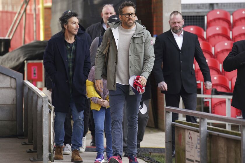 Wrexham co-owner, actor Ryan Reynolds arrives prior to the English FA Cup 4th round Soccer match between Wrexham and Sheffield United at The Racecourse Ground, in Wrexham, England, Sunday, Jan. 29, 2023. (Peter Byrne/PA via AP)