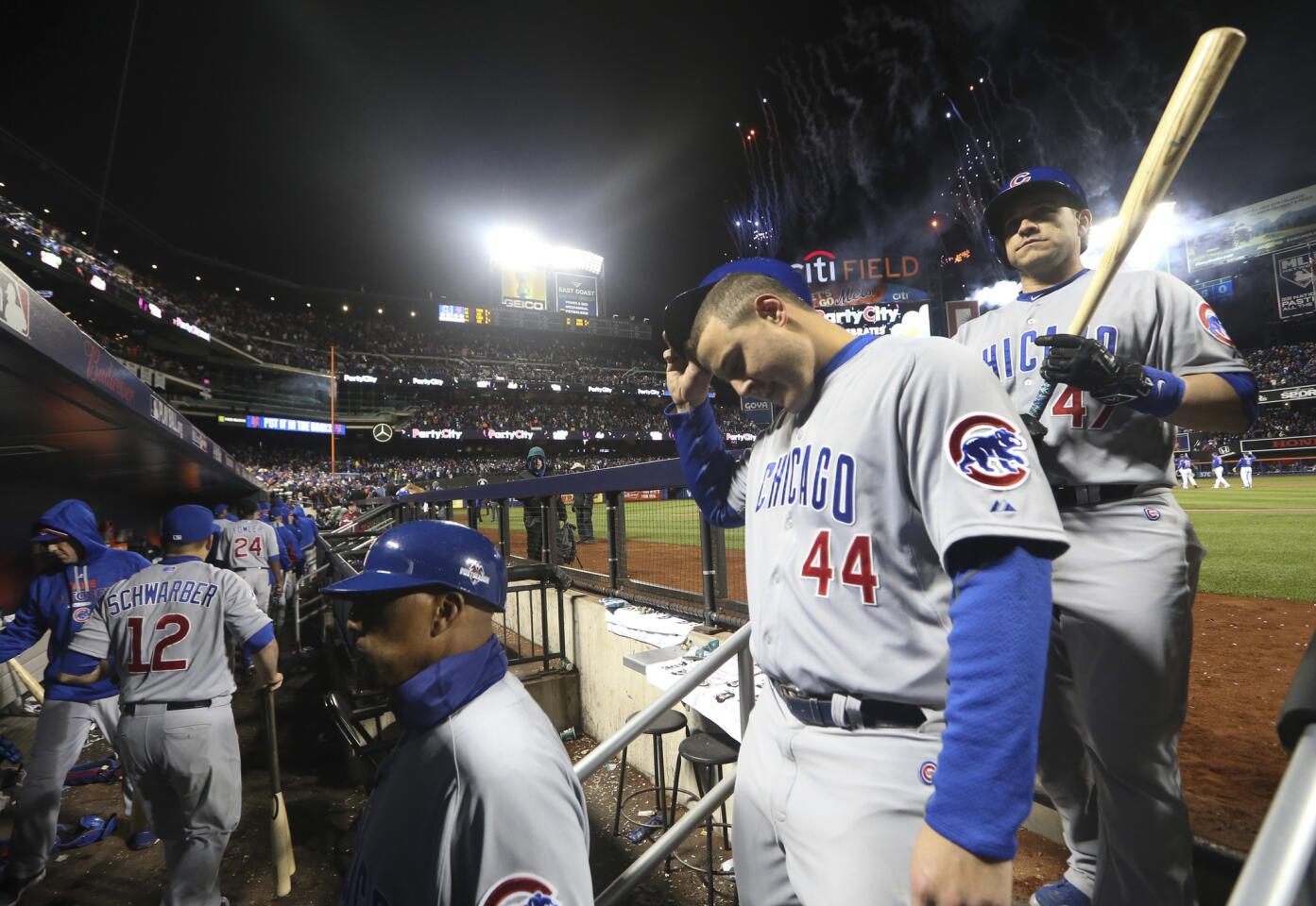 Anthony Rizzo and Miguel Montero on their way to the locker room,after their team's 4-1 loss.
