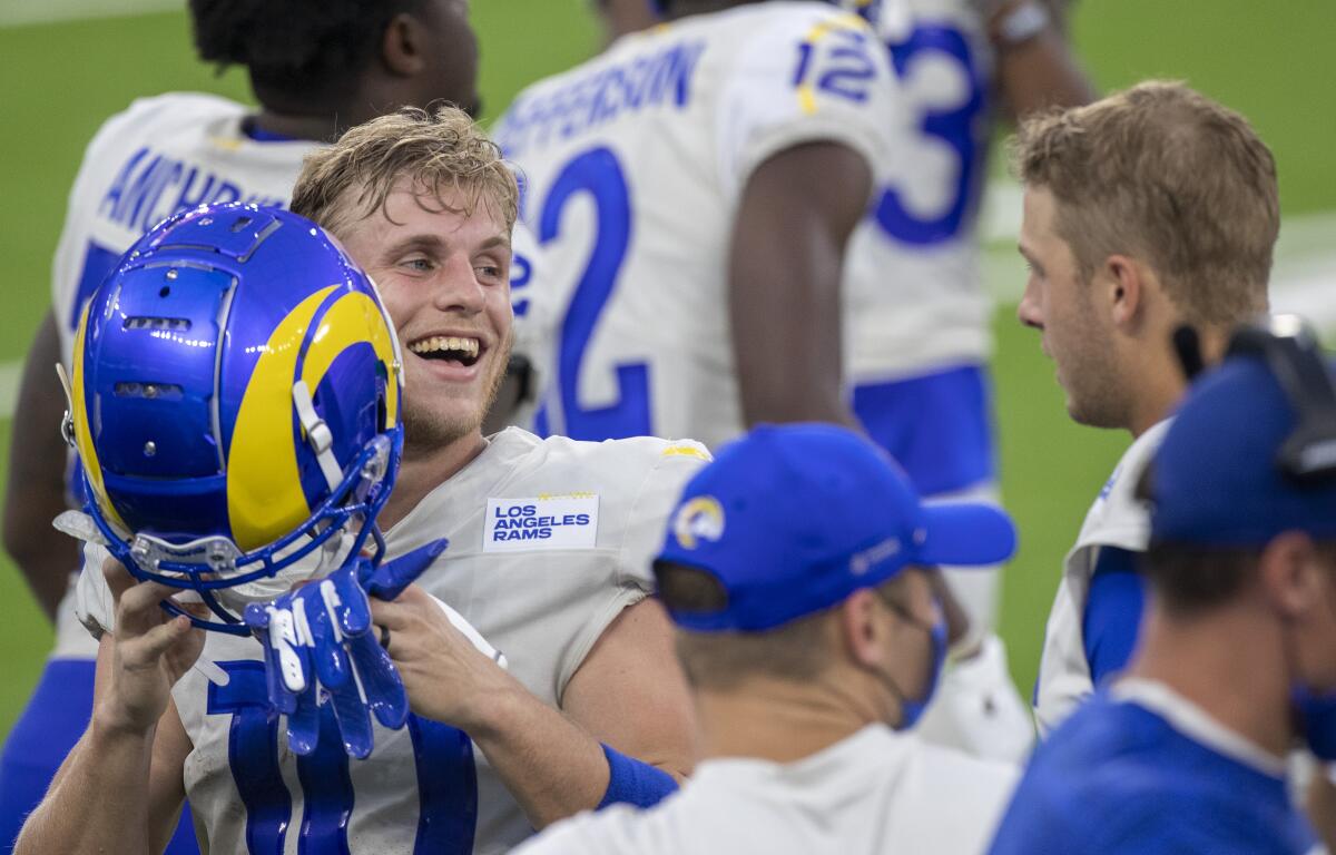 Rams receiver Cooper Kupp, left, chats with quarterback Jered Goff during a scrimmage at SoFi Stadium on Aug. 22, 2020.