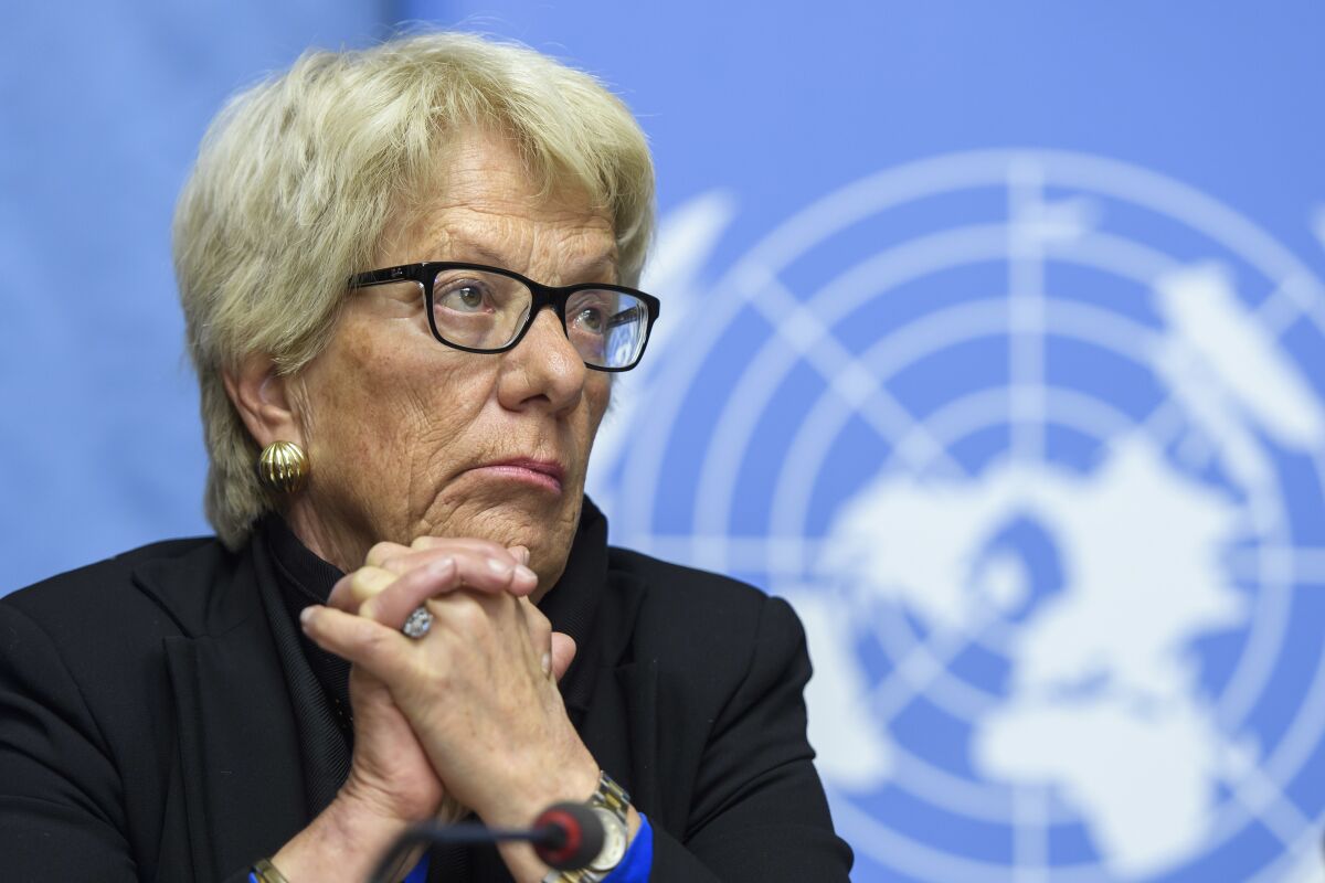 FILE- Carla del Ponte, then Member of the Independent Commission of Inquiry on the Syrian Arab Republic, attends a press conference, at the European headquarters of the United Nations in Geneva, Switzerland, Wednesday, March 1, 2017. The former chief prosecutor of the International Criminal Court has called for an international arrest warrant to be issued for Russian President Vladimir Putin. “Putin is a war criminal,” Carla Del Ponte told Swiss newspaper Le Temps in an interview published Saturday, April 2, 2022. (Martial Trezzini/Keystone via AP, File)