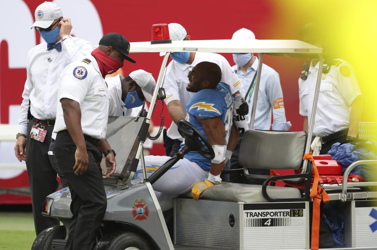 Chargers running back Austin Ekeler is carted off the field.