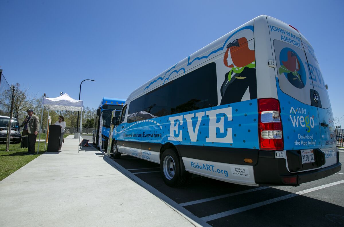 On-demand transit service vehicles parked in Anaheim.