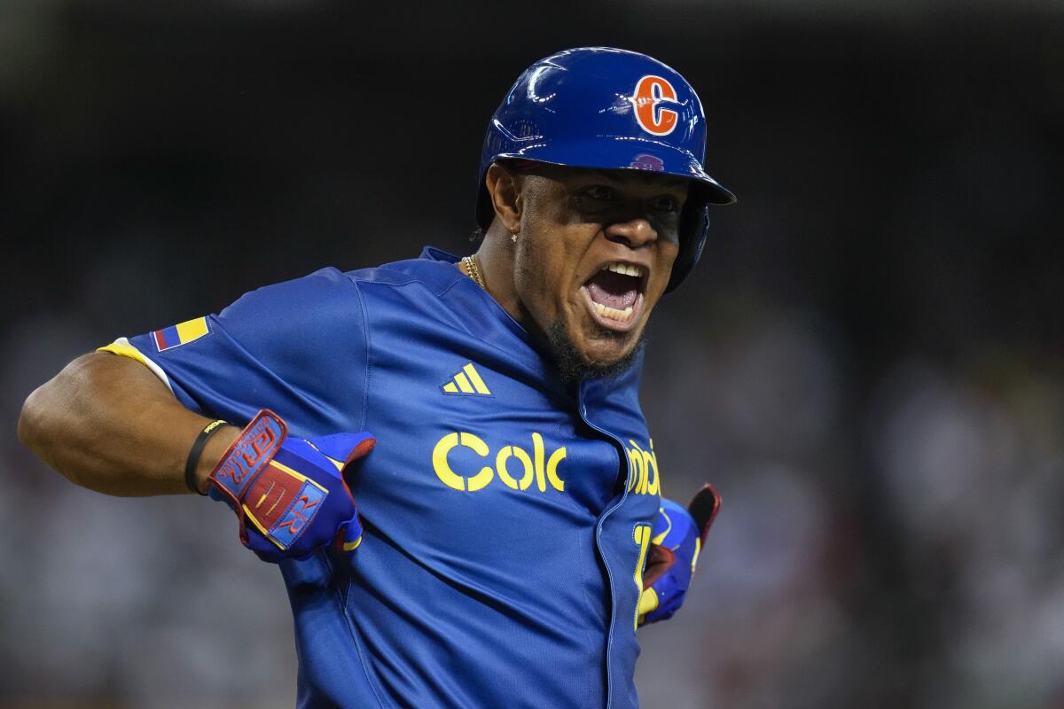 Colombia's Reynaldo Rodriguez reacts after hitting a two-run home run against Mexico during the fifth inning March 11, 2023. 