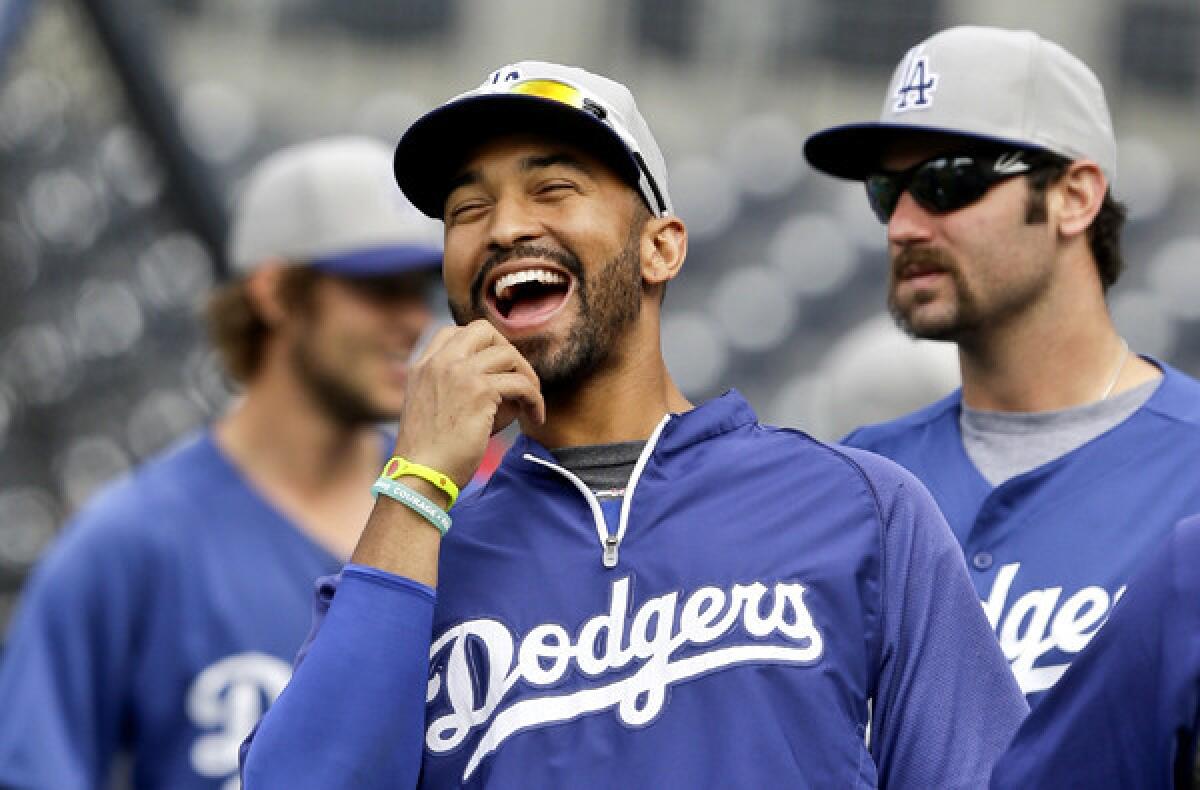Center fielder Matt Kemp was all smiles before the game against the Padres, a day after the Dodgers clinched a playoff spot.