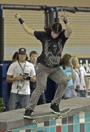 Gold Medal winner Chris Cole, of Statesville, N.C. competes in the Skateboard Street Men's Final at the Home Depot Center in Carson Friday.