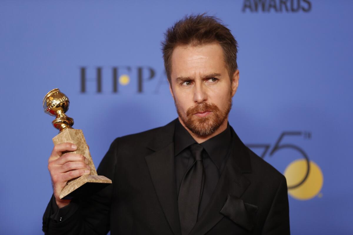 Winner of supporting actor in film honors Sam Rockwell backstage at the Golden Globes.