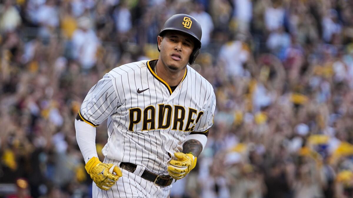 San Diego Padres' Manny Machado runs.