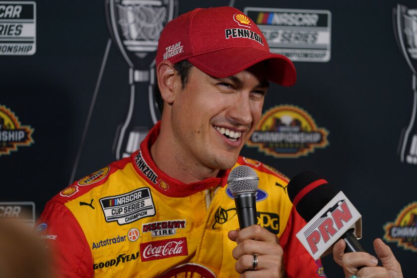FILE - NASCAR Cup Series driver Joey Logano speaks during the NASCAR Championship media day, Thursday, Nov. 3, 2022, in Phoenix. Joey Logano has a simple target for the future even as he celebrates his 2022 NASCAR Cup championship. Add yet another.(AP Photo/Matt York, File)
