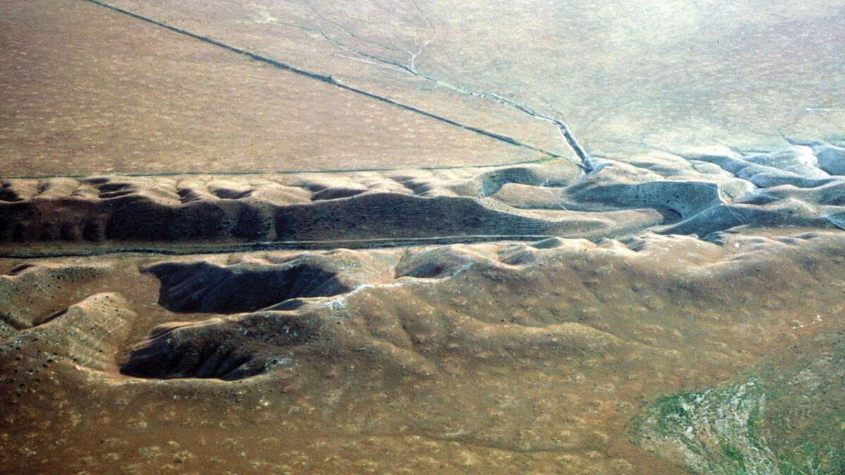 A view of the San Andreas fault in the Carrizo Plain. A valley is deeply eroded along the fault. 