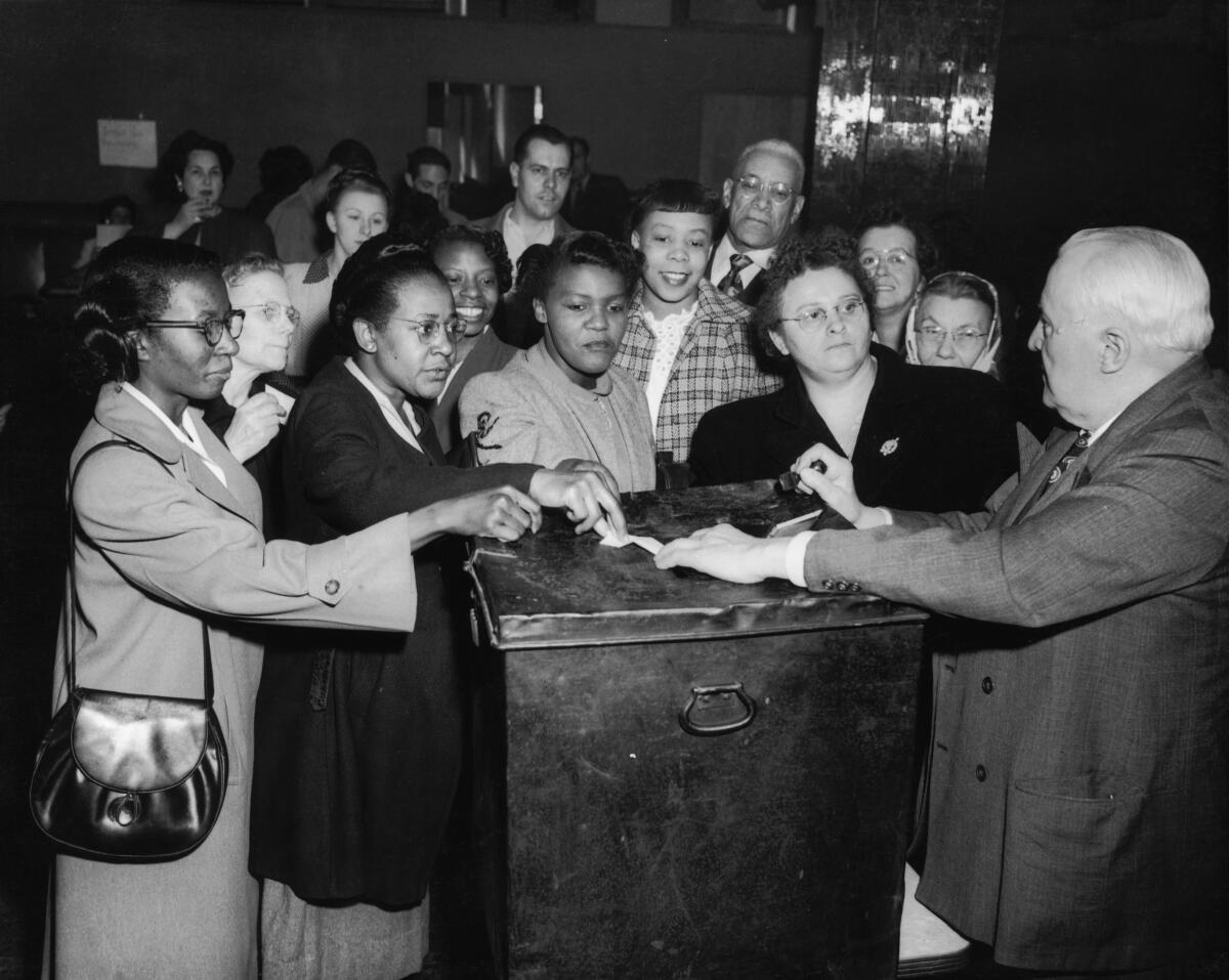 Black women voters at a polling station in Pittsburgh, 1950.