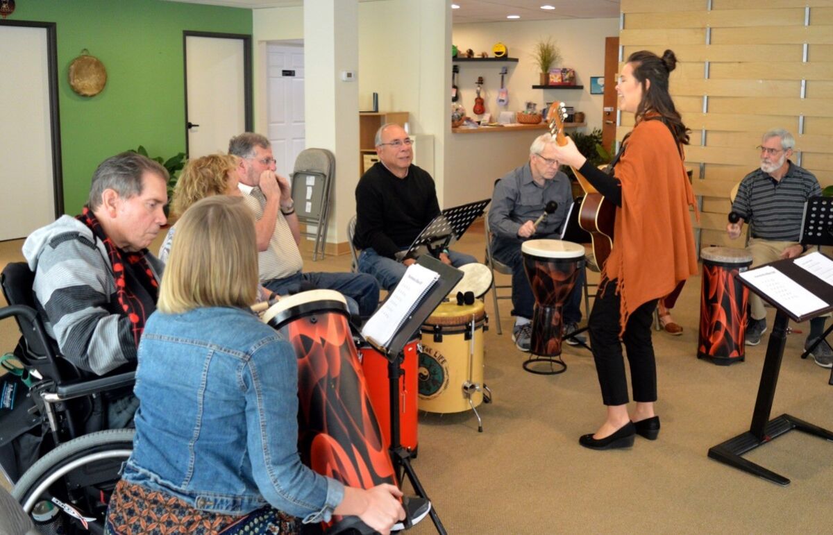 Music therapist Annela Flores with MusicWorx leads a session for older adults.