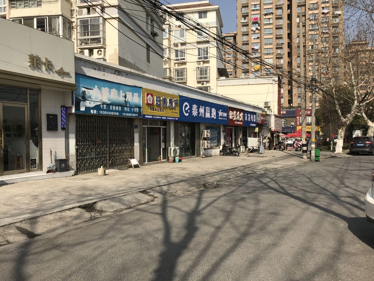 The street in Taizhou, Jiangsu province where a delivery driver set himself on fire in January.