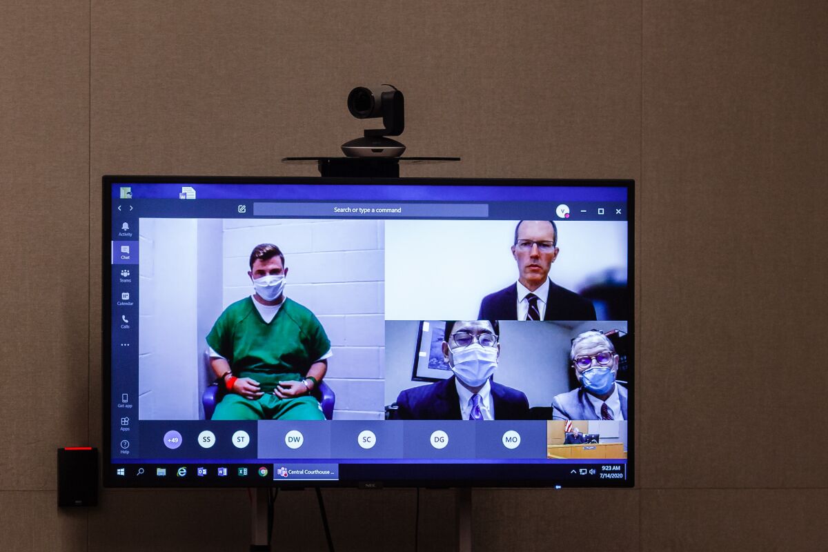 Photo of TV monitor during video arraignment