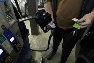 A customer prepares to pump gasoline into his car at a Sam's Club fuel island in Gulfport, Miss., Feb. 19, 2022. The Russia-Ukraine crisis is helping to raise oil and gasoline prices to high levels. Gasoline prices are setting a new record, and they're likely to go higher in the coming weeks. The national average topped $4.17 a gallon on Tuesday, March 8 according to auto club AAA. Californians already pay over $5 on average, and residents in a few other states could soon join them. (AP Photo/Rogelio V. Solis)
