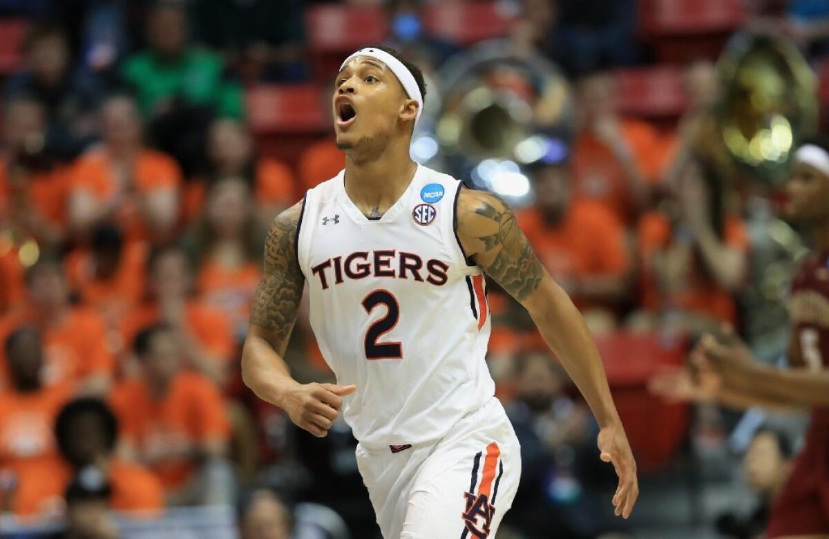 Auburn's Bryce Brown reacts during the second half of an NCAA tournament game against Charleston.