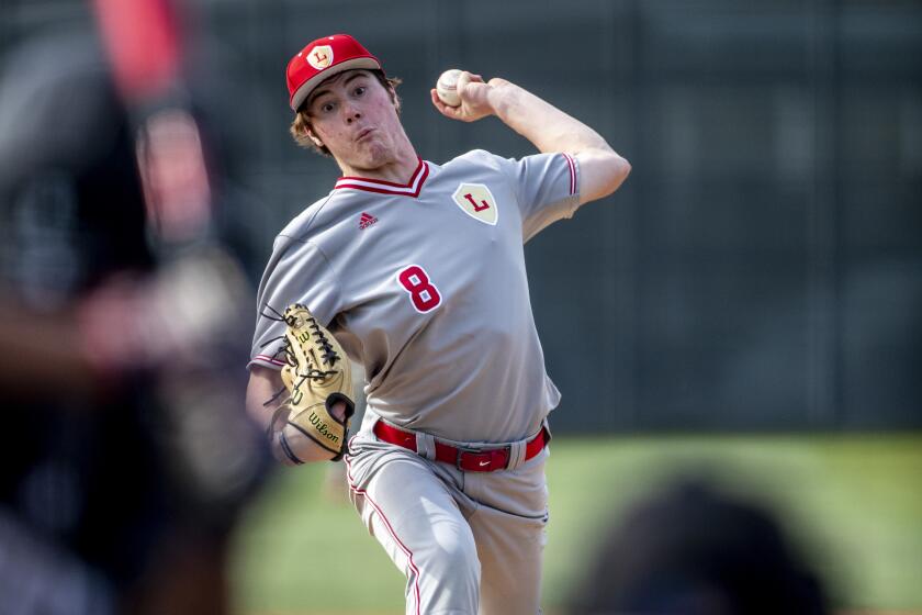 ANAHEIM, CA - MARCH 15, 2022: Orange Lutheran Oliver Santos (8) pitches.