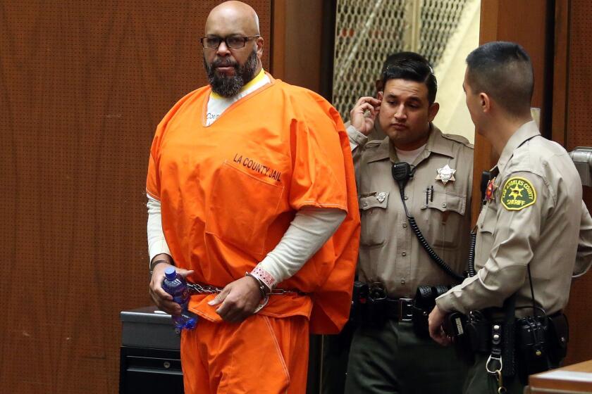 Marion "Suge" Knight appears in Los Angeles court for a pretrial hearing on Thursday. Knight has a new lawyer in a murder case.