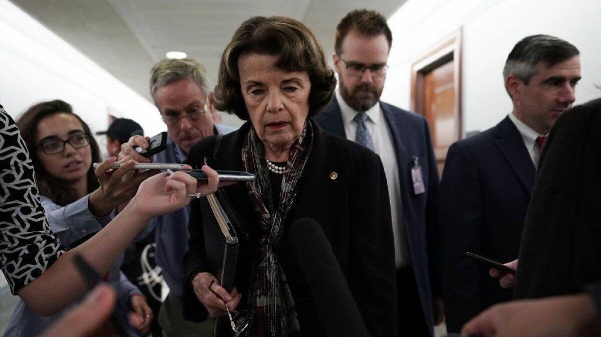 California Sen. Dianne Feinstein, ranking Democrat of the Senate Judiciary Committee, leaves after the panel approved, along party lines, the nomination of Judge Brett Kavanaugh to the Supreme Court on Friday at the Dirksen Senate Office Building on Capitol Hill in Washington.