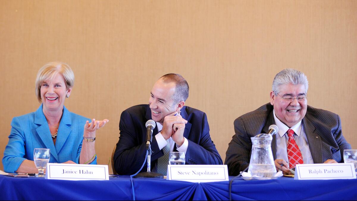 Janice Hahn with her two opponents in the county supervisor race -- Steve Napolitano, center, and Ralph Pacheco -- during a debate in Torrance.