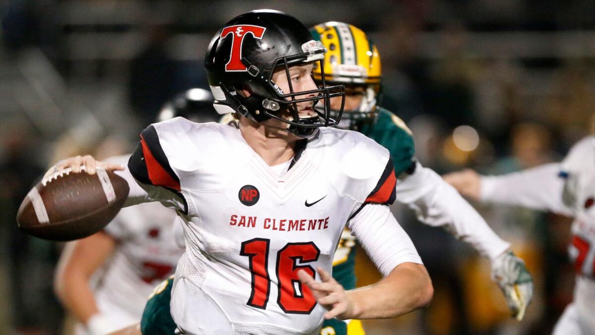 San Clemente quarterback Jack Sears looks to pass against Edison on Dec. 10.