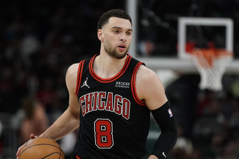 Chicago Bulls' Zach LaVine during the second half of Game 1 of their first round NBA playoff basketball game against the Milwaukee Bucks Sunday, April 17, 2022, in Milwaukee. The Bucks won 93-86 to take a 1-0 lead in the series. (AP Photo/Morry Gash)