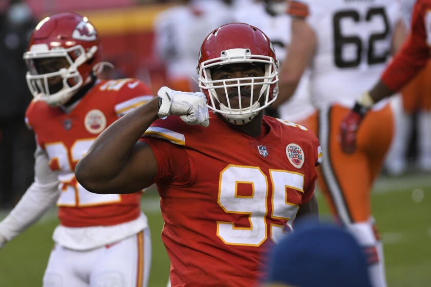 Kansas City Chiefs defensive tackle Chris Jones celebrates during the second half of an NFL divisional round football game against the Cleveland Browns, Sunday, Jan. 17, 2021, in Kansas City. The Chiefs won 22-17. (AP Photo/Reed Hoffmann)