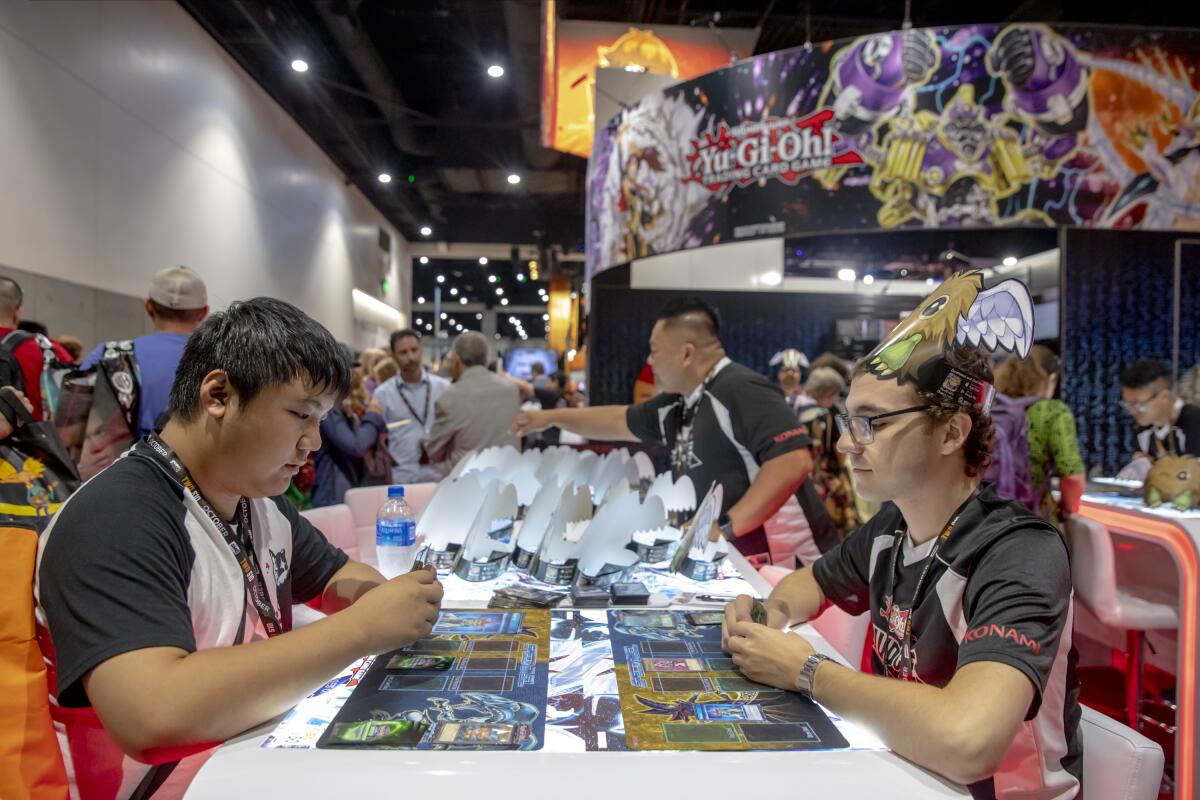 who created the yugioh card game Yu-Gi-Oh!